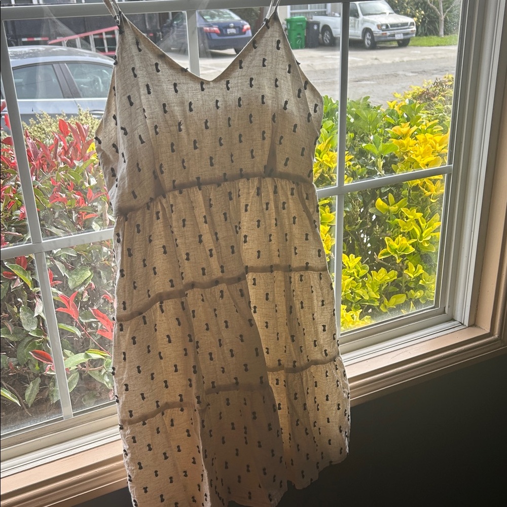 Elegant Cream Mini Dress with Black Pattern